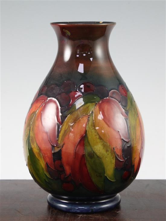 A Moorcroft leaf and berry flambe baluster vase, c.1945-49 24.5cm, rim damage